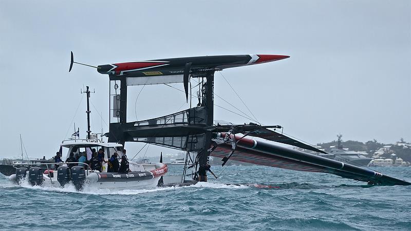 Emirates Team New Zealand - recovery - power goes on from the chase boat and the AC50 starts to come upright - Race 4 - Semi-Finals, America's Cup Playoffs- Day 11, June 6, 2017 (ADT) photo copyright Richard Gladwell taken at  and featuring the AC50 class