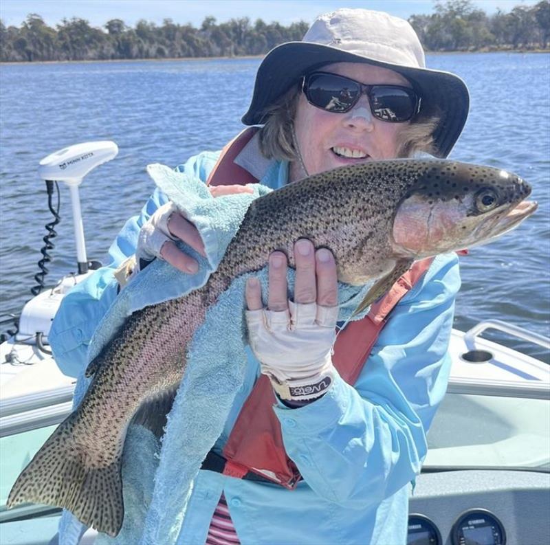 Sheree with some solid Penstock fish caught on nymphs and emergers - photo © Spot On Fishing Hobart