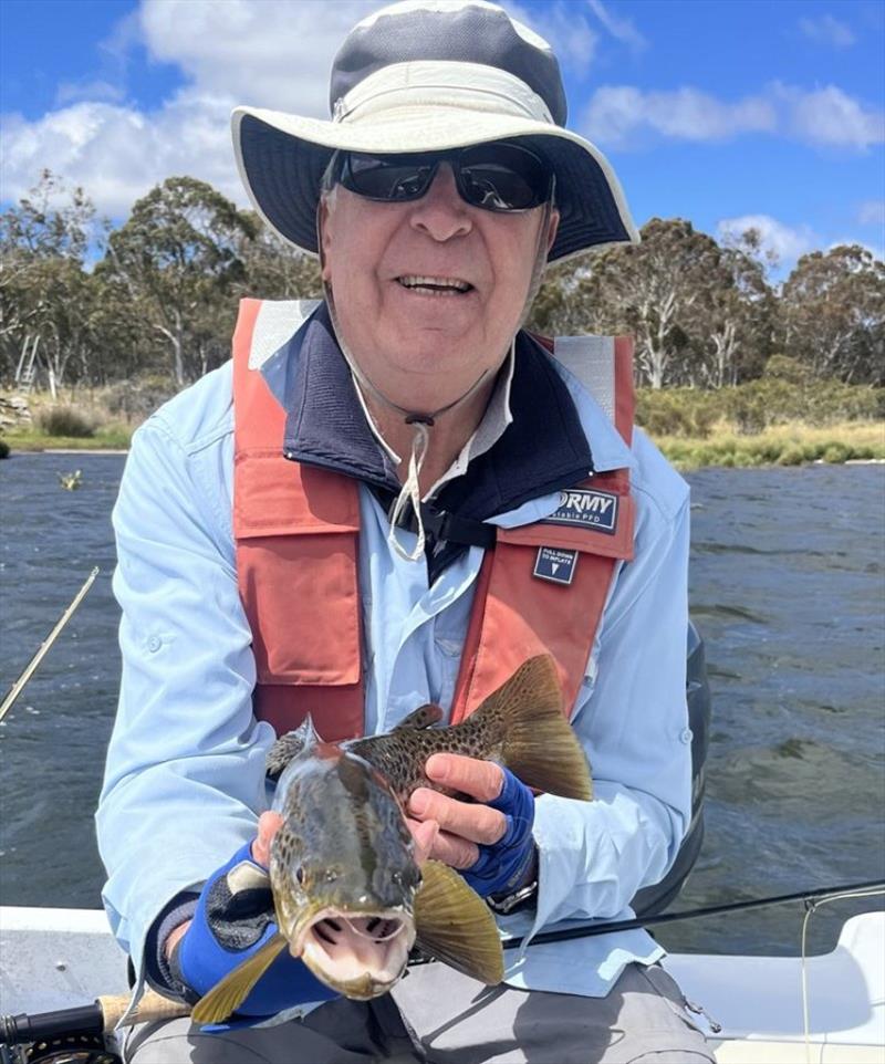 Rob with some solid Penstock fish caught on nymphs and emergers - photo © Spot On Fishing Hobart