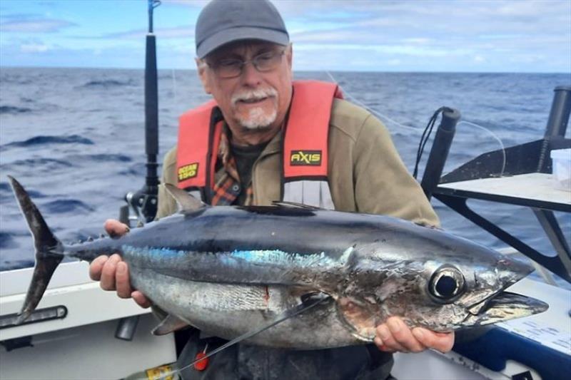 Ian with a nice albacore tuna caught at Eaglehawk Neck photo copyright Spot On Fishing Hobart taken at  and featuring the Fishing boat class