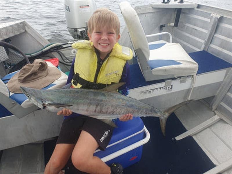 Seven year old Charli is a very capable young fisho. He caught the bait, rigged it, and caught this fine broadie all by himself. Well done champ! photo copyright Fisho's Tackle World taken at  and featuring the Fishing boat class
