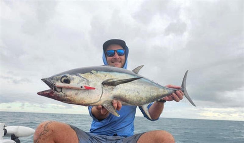 Staff member Jacko loves chasing 'tail' and this one fella victim to the GT Ice-cream. Aerial strikes on these are insane! photo copyright Fisho's Tackle World taken at  and featuring the Fishing boat class