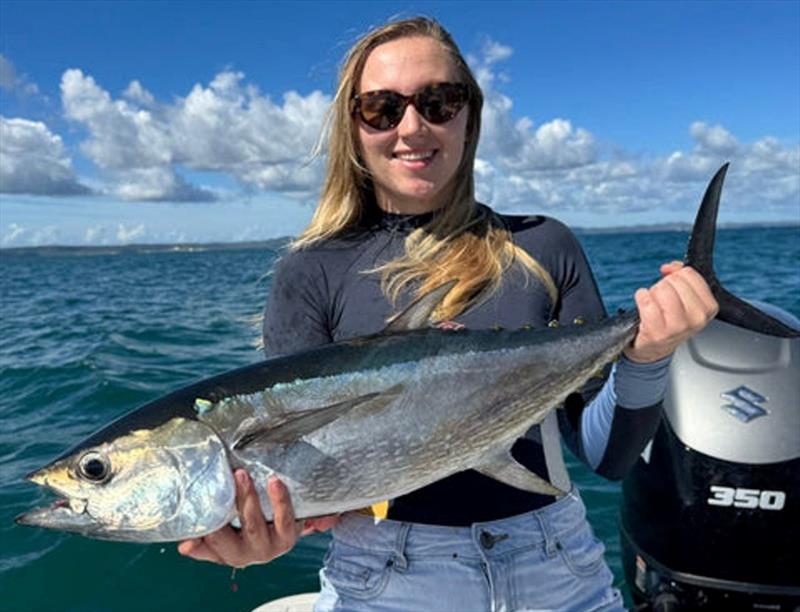 Christie Radosevic getting in on the red hot tuna action, scoring this school sized long-tail tuna photo copyright Fisho's Tackle World taken at  and featuring the Fishing boat class
