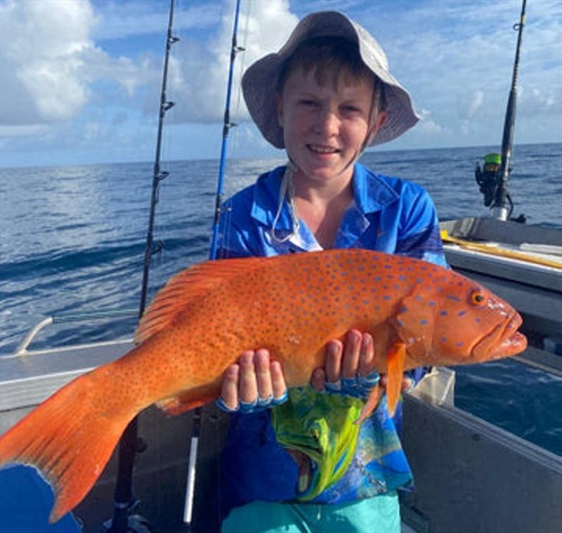 Archie Caswell supporting a lovely central bay coral trout, well done young fella photo copyright Fisho's Tackle World taken at  and featuring the Fishing boat class