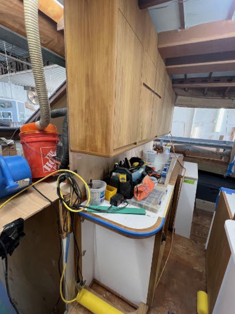 Hull #9 - Upper and lower galley cabinets installed - photo © Michael Rybovich & Sons