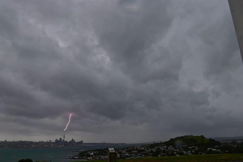 Lightning strikes the Auckland Skytower ahead of the Force 12 winds which struck the western coast of the province later that night photo copyright North Shore Weather taken at 