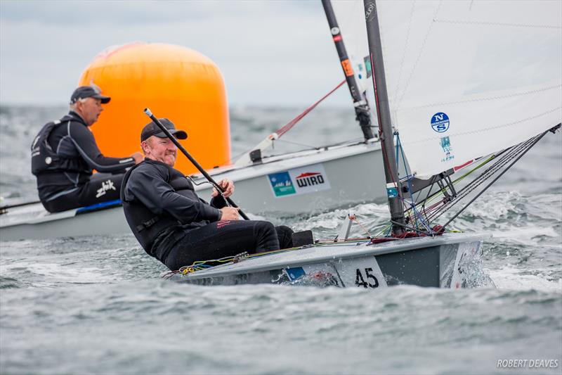 Charlie Cumbley on day 5 at 2018 OK Dinghy World Championship, Warnemünde photo copyright Robert Deaves taken at  and featuring the OK class