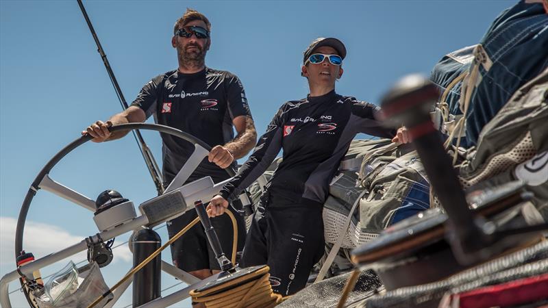 Leg 6 to Auckland, day 18 on board Sun hung Kai / Scallywag. David Witt and Libbby Greenhlagh while the crew is manoeuvering to change sails. 25 February,  photo copyright Jeremie Lecaudey / Volvo Ocean Race taken at  and featuring the Volvo One-Design class
