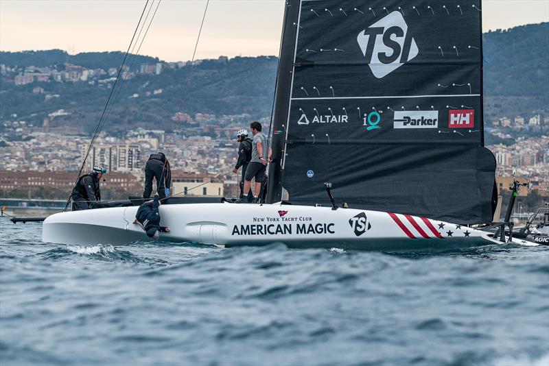Crew member checks for damage - American Magic - AC40 - Day 99 - March 4, 2024 - Barcelona photo copyright Job Vermeulen / America's Cup taken at New York Yacht Club and featuring the AC40 class
