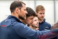 Nico Stahlberg, Franco Noti, Maxim Bachelin and Barnabe Delarze take a first look at AC75 Boat One as she arrives at Alinghi Red Bull Racing base in Barcelona, Spain _ March 4, 2024 © Olaf Pignataro/Red Bull Content Pool