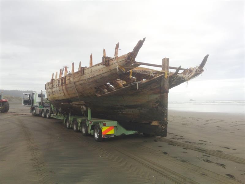 The remains of the 53ft Daring lost in 1865 at the entrance to the Kaipara Harbour are trucked out for restoration - photo © Classic Yacht Charitable Trust