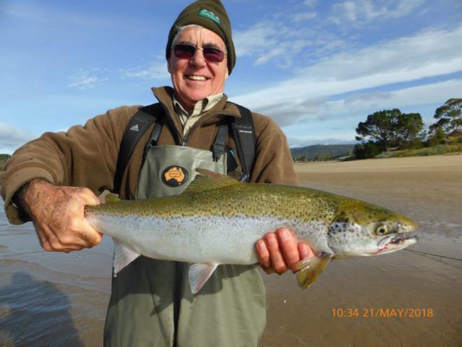 John Bessell with an escaped Atlantic salmon - photo © Carl Hyland
