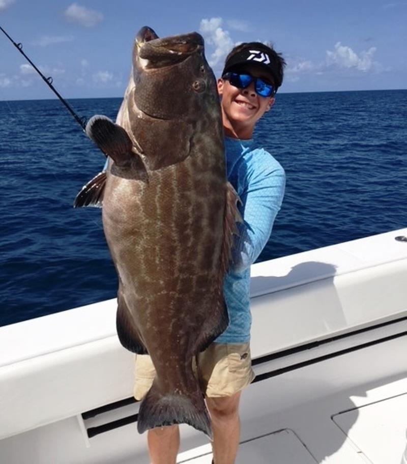 Junior angler Daniel Delph potentially set the new Male Junior world record for black grouper (Mycteroperca bonaci) with this quality 24.5-kilogram (54-pound) fish that he caught on June 28, 2018 while fishing off Key West, Florida photo copyright IGFA taken at  and featuring the Fishing boat class