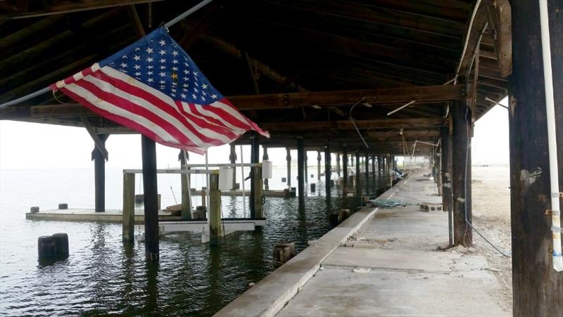 Damaged docks after a hurricane photo copyright NOAA Fisheries taken at  and featuring the Fishing boat class