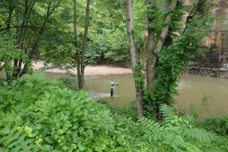Taking measurements post-dam removal in the Patapsco River - photo © NOAA Fisheries