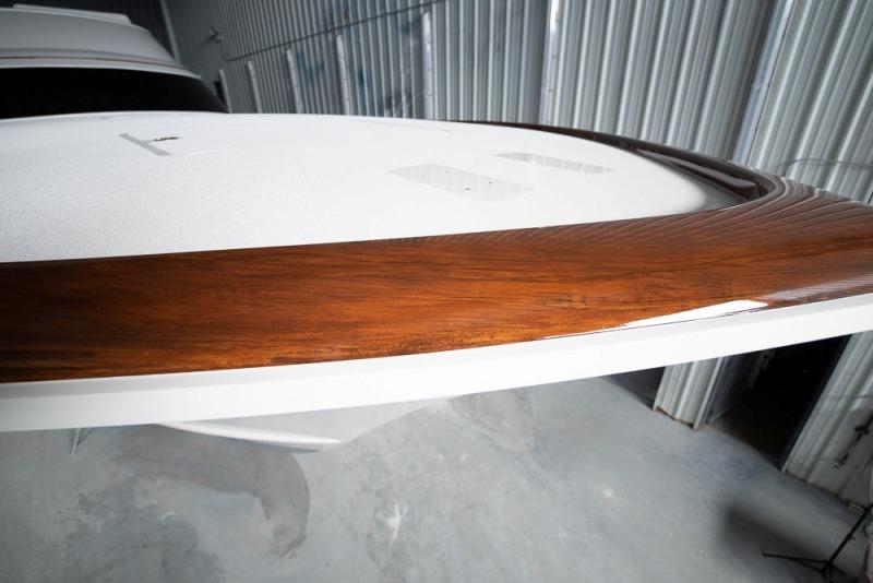 Detail on GameChanger's faux teak toe rail photo copyright Bayliss Boatworks taken at  and featuring the Fishing boat class