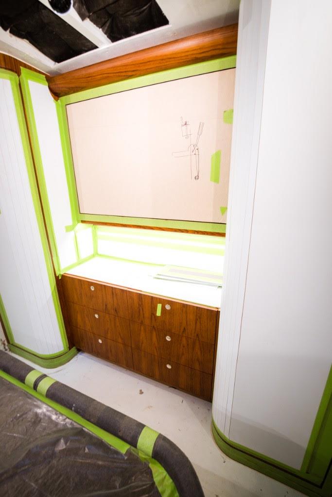 Master stateroom TV cabinet/dresser, and tackle room cabinet and floor installation progress photo copyright John Bayliss taken at  and featuring the Fishing boat class