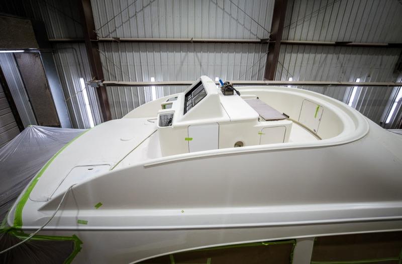 Flybridge, in primer, with glove boxes cut and electronics dash developing - photo © Bayliss Boatworks