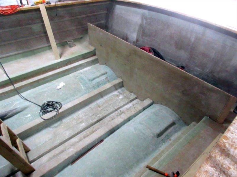 The lazarette bulkhead has been cut to shape and is ready to glue in and be glass tabbed - Hull 67 - 56' Renegade photo copyright Jarrett Bay Boatworks taken at  and featuring the Fishing boat class