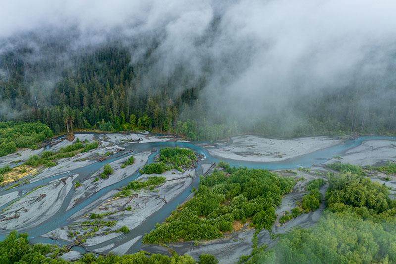 Mist over the Hoh River photo copyright Adobe Stock taken at  and featuring the Fishing boat class
