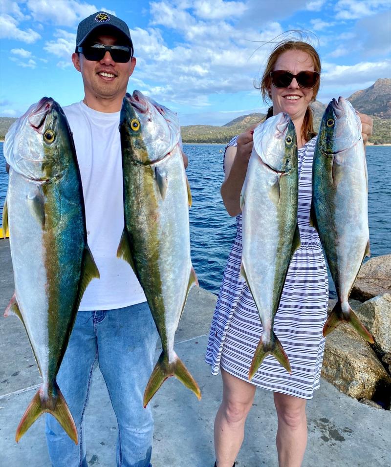Jonah and Helen caught kingfish from Coles Bay on squid and soft plastics - photo © Spot On Fishing Hobart