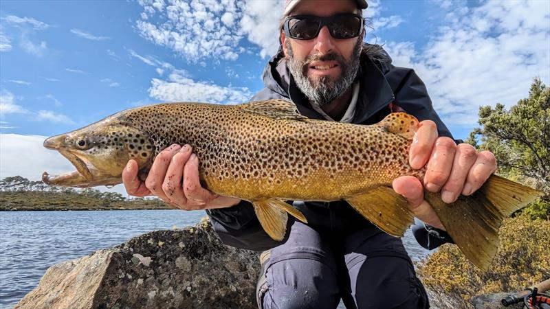 Mark with another bauty from the Westerns. He got 5 very good fish but this one clearly the stand out. I tentatively placed it at 7.5-8.5lb. It fell to a cricket pattern photo copyright Spot On Fishing Hobart taken at  and featuring the Fishing boat class