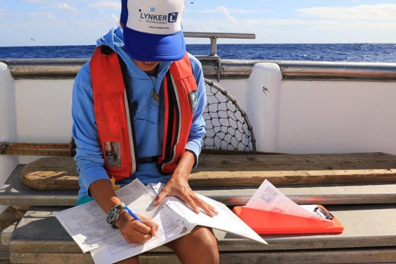 Holly recording data - photo © NOAA Fisheries