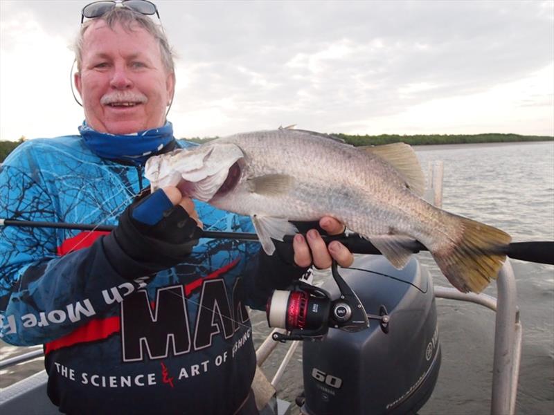 Gary with a barra that took a liking to a live poddy mullet that was cast into a small creek during the run-off. - photo © Boat Accessories Australia
