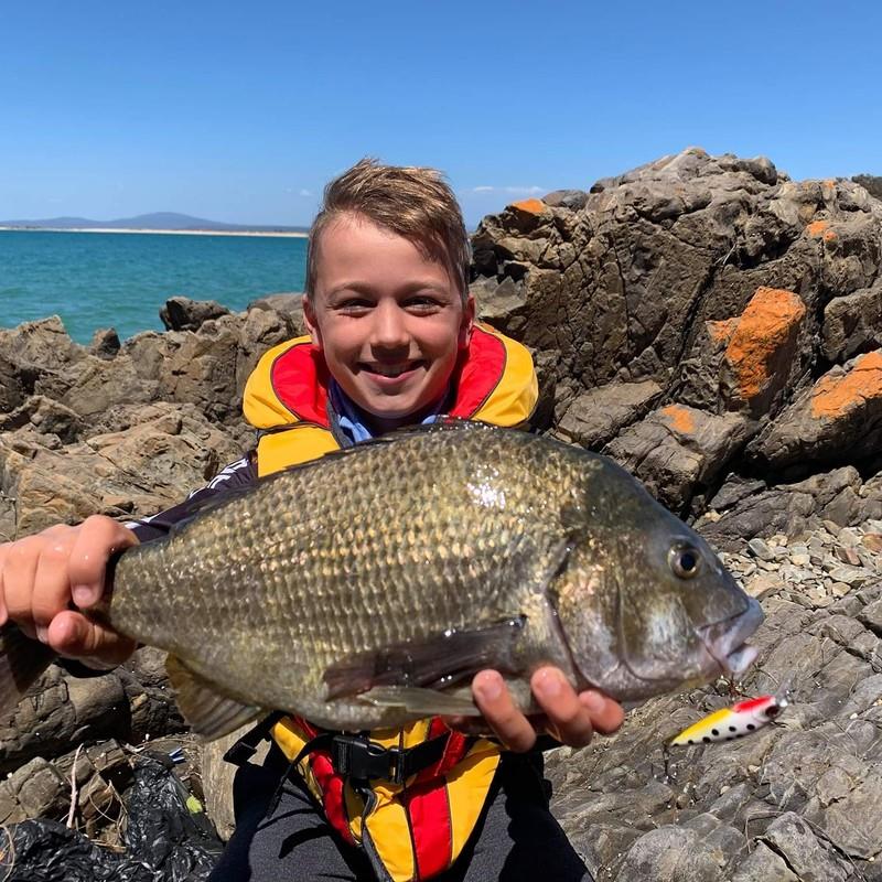 Lucas Millwood (aged 10) with a cracking Southern Black Bream caught off the rocks at Bridport photo copyright Carl Hyland taken at 