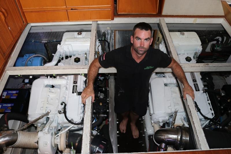 Brad Belcher, from Belcher Diesel Service stands between the pair of John Deere 6090SFM85s that now occupy the engine room and provide a smoothness of power and a power curve without any flat spots photo copyright Power Equipment Pty Ltd taken at 