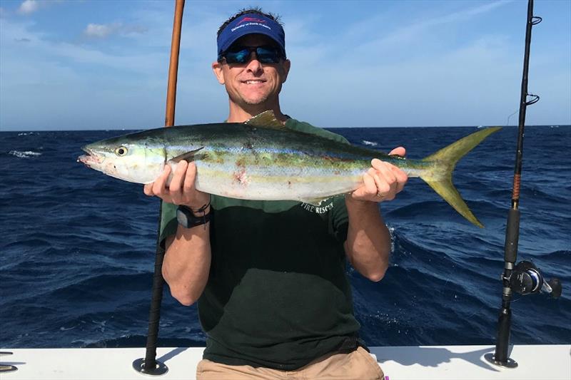 Russell Dunn, National Policy Advisor for Recreational Fisheries, with a nice rainbow runner caught off Ft. Pierce, Florida. - photo © NOAA Fisheries