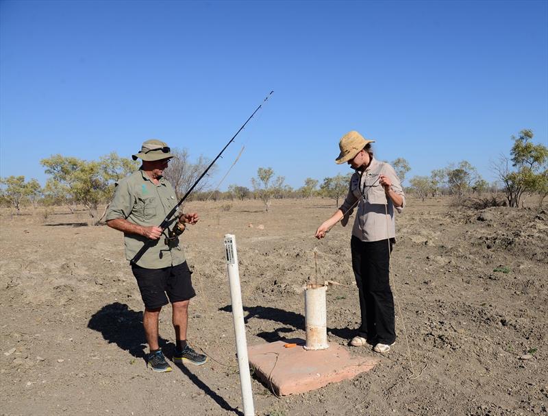 CSIRO's Dr Daryl Nielsen and Charles Darwin University's Dr Stefanie Oberprieler fishing for stygofauna in central Northern Territory photo copyright CSIRO taken at 