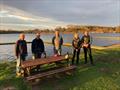 Prize winners enjoy the apres-sail sunshine at the Rollesby Broad New Year's Open 2022 © RBSC