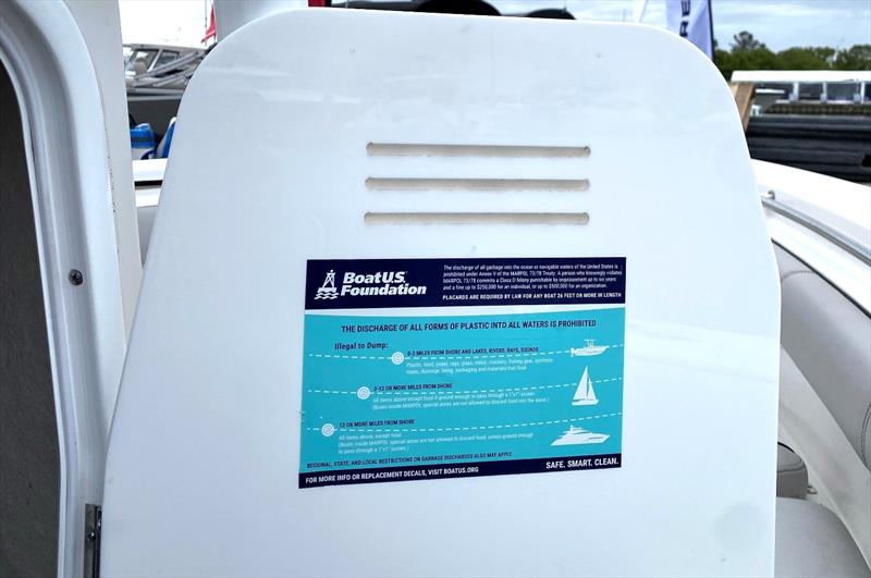 Putting the BoatUS Foundation trash placard decal in a prominent spot – in this case on the inside of a head door – helps remind everyone aboard how to handle waste photo copyright Scott Croft taken at 