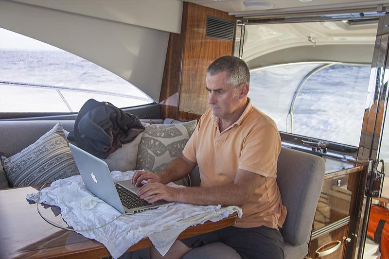 Working away on board Riviera's recently premiered and marvellous 4800 Sport Yacht Platinum Edition - photo © John Curnow