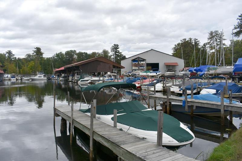 Boats docked at Fay's Boatyard in Gilford. Nearly all are fiberglass boats and, unless a solution can be found for recycling fiberglass, their hulls will end up in a landfill photo copyright Adam Drapcho/The Laconia Daily Sun taken at  and featuring the Power boat class