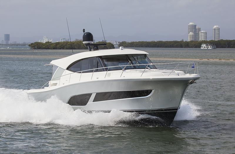 Very high freeboard is evident, as is the distinct chine to reduce spray - Riviera 505 SUV World Premiere photo copyright John Curnow taken at  and featuring the Power boat class