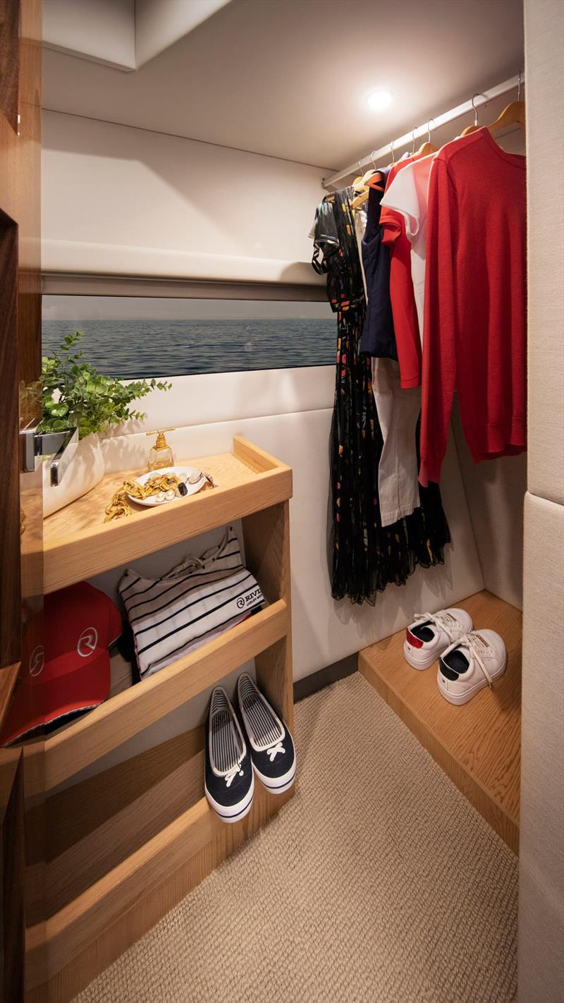 Full height hanging wardrobe (with a view) in the Master Stateroom - Riviera 505 SUV World Premiere photo copyright Riviera Australia taken at  and featuring the Power boat class