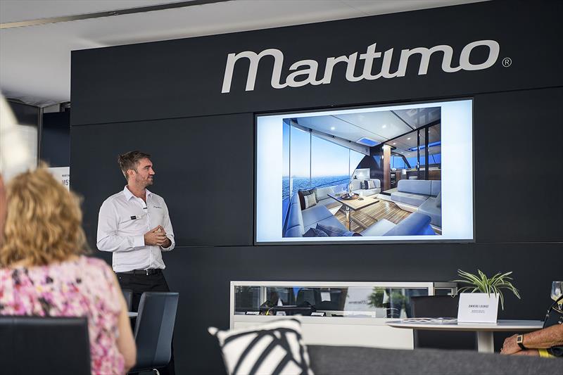 Tom Barry-Cotter walks prospective buyers through the new Maritimo S55 photo copyright Maritimo taken at  and featuring the Power boat class
