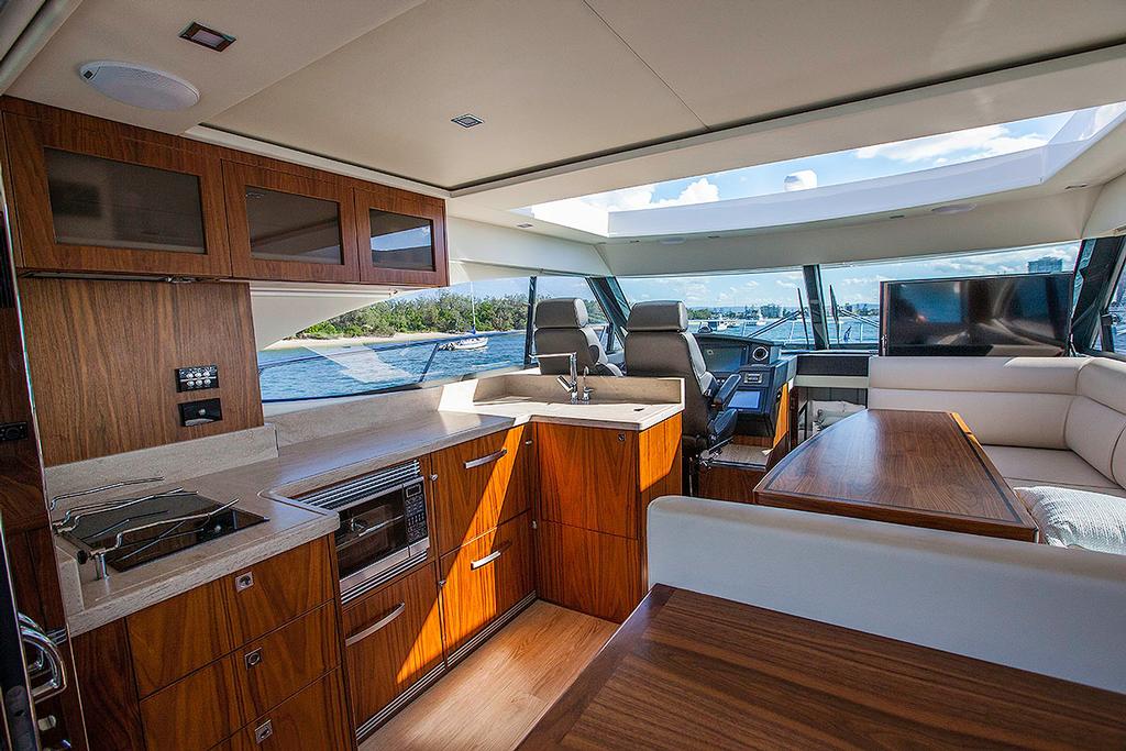 Galley is not only easily accessible, it features all you will ever need to prepare meals for all your family and friends. - Riviera 4800 Sport Yacht photo copyright  John Curnow taken at  and featuring the  class