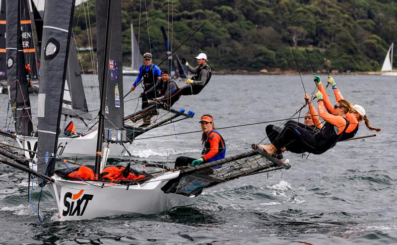 Sixt and Vaikobi close racing during the 18ft Skiff Queen of the Harbour 2024 photo copyright SailMedia taken at Australian 18 Footers League and featuring the 18ft Skiff class
